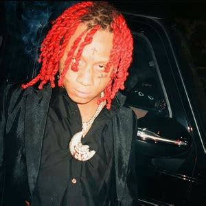 The Grit and Glamour of Black Magic: Trippie Red's Visual Aesthetic